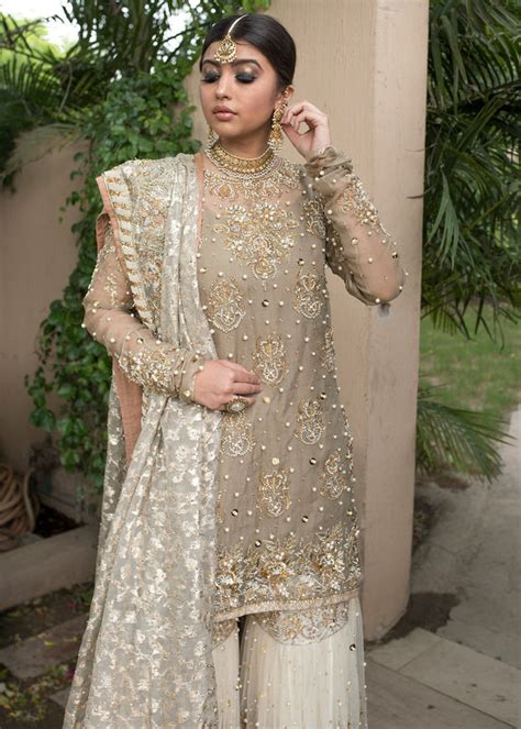 White Gharara Dress With Elegant Pearl And Sequins Work Nameera By Farooq