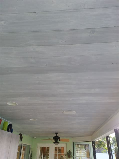 Whitewashed Wood Ceiling Over Gray Stain Painted Wood Ceiling