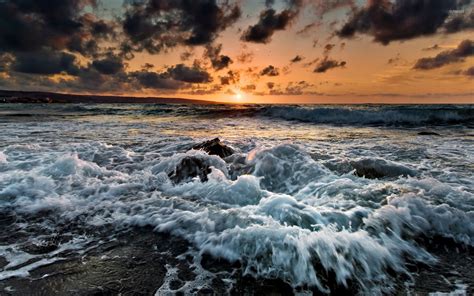 Waves Reaching The Rocky Beach At Sunset Wallpaper Beach Wallpapers 48984