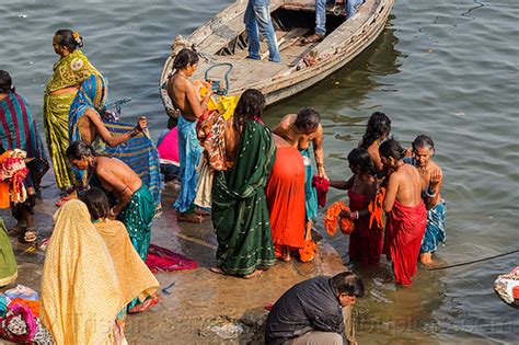 Hindu Women Bathing In The Ganges River In Varanasi India