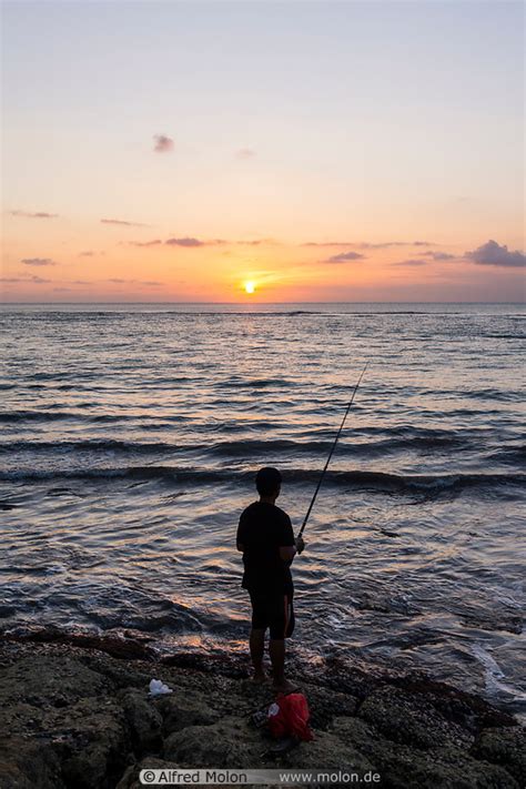 Photo Of Fisherman At Sunset Kuta Bali Indonesia Added Image Id77356