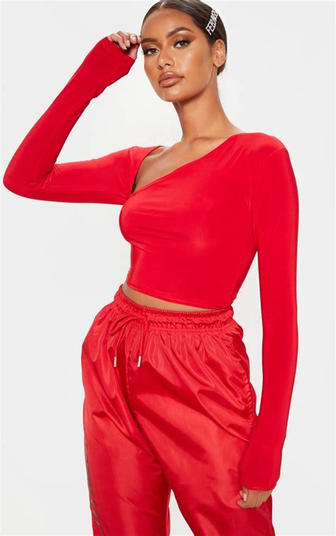 Red Slinky Asymmetric Long Sleeve Crop Top Prettylittlething Usa