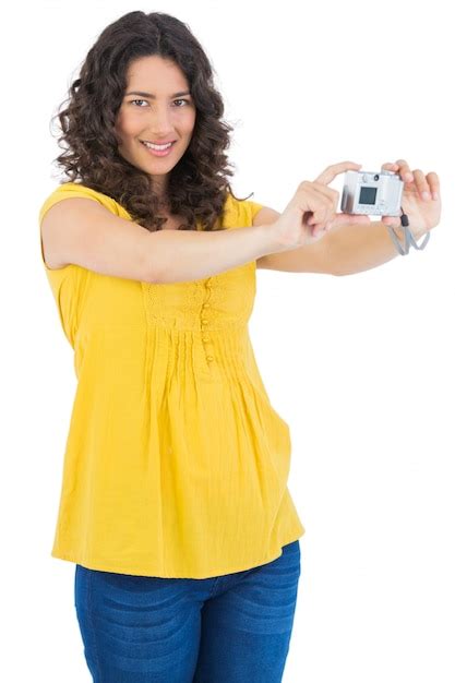 Premium Photo Content Curly Haired Brunette Taking Picture Of Herself