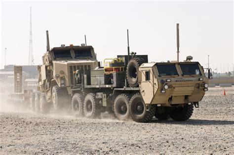 Military Vehicles Spotlight M984 Wrecker Towing Heavy Equipment