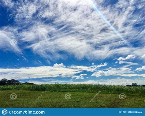 Clouds Blue Sky And Green Pasture Land Stock Image Image Of Hill