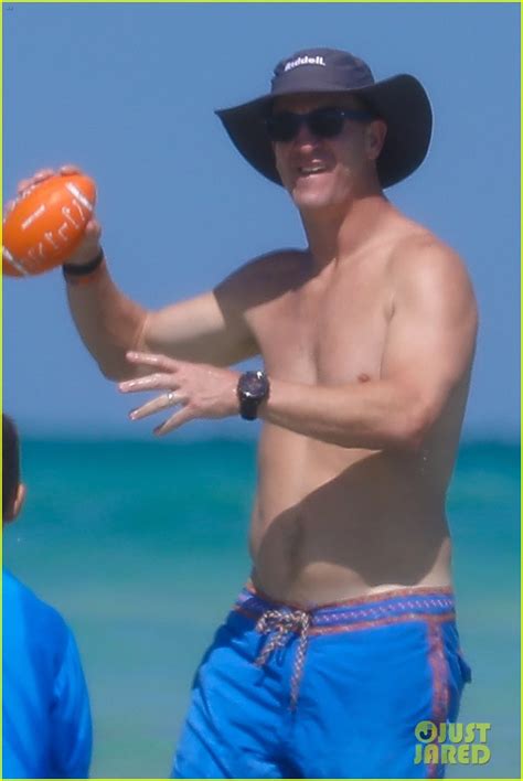 peyton manning flaunts ripped abs while shirtless at the beach photos photo 4492994 bikini