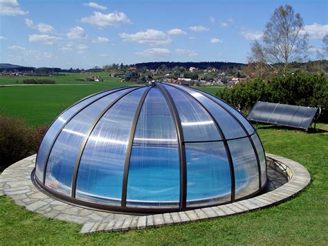The pool measures 8' x 27'3 on a 16 'x 34' minimum pad with a. Swimming Pool Enclosures | Telescopic Retractable Buildings over swimming pools
