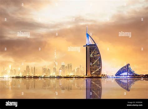 Dramatic Sunset Over The Dubai Skyline With The Burj Khalifa In The