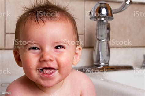 Cute Baby Boy Bathing In Kitchen Sink Stock Photo Download Image Now