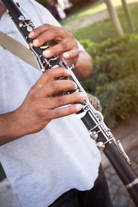 Hands Of Man Playing The Clarinet In The Orchestra Stock Image Image