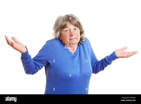 Clueless Elderly Woman Shrugging With Her Shoulders Stock Photo Alamy