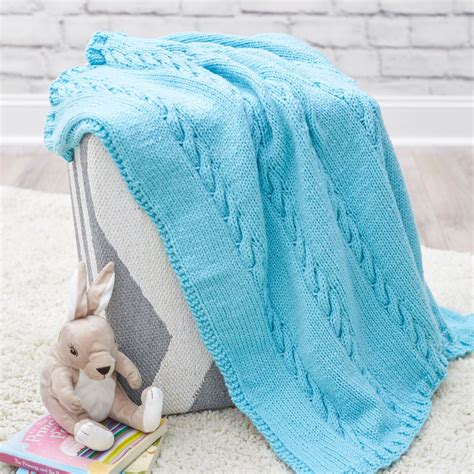 Find hundreds of free baby blanket patterns right here! Red Heart Classic Cable Baby Blanket | Yarnspirations in ...