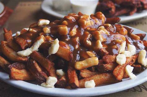 Poutine is a fast food dish that originated in quebec and can now be found across canada. 6 Epic Poutines in Brampton You Need to Try