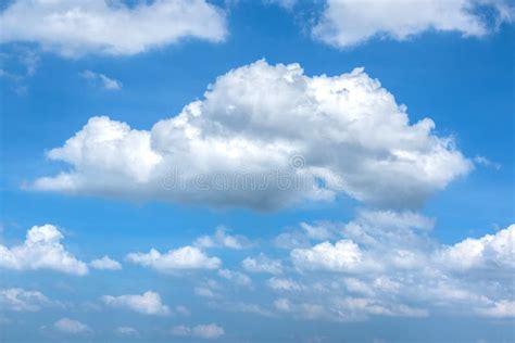 Puffy White Clouds In Blue Sky For Natural Background Stock Image