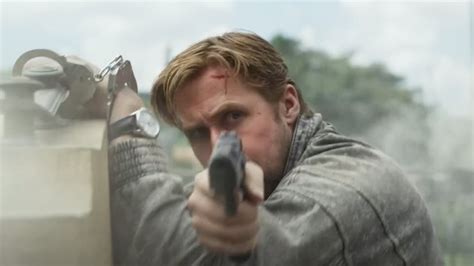 The Gray Man Trailer Its Ryan Gosling Vs Chris Evans In The Russos