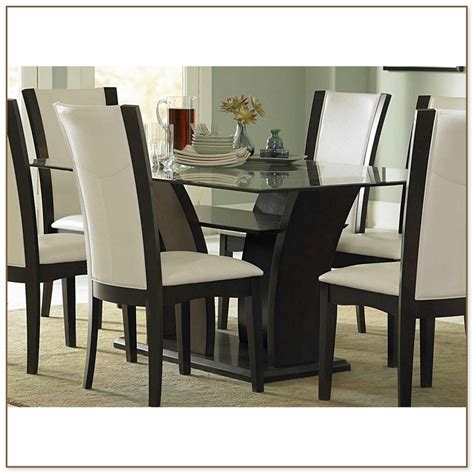 Dining table sets are a fast way to make a dining room look perfectly pulled together. Glass Top Dining Table Sets