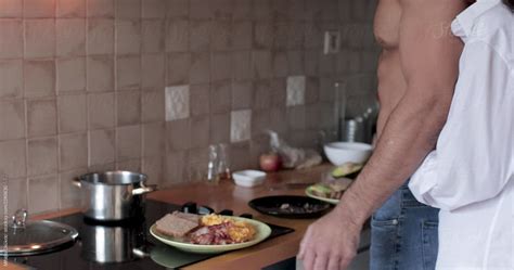 Couple Making Breakfast Together By Stocksy Contributor Mihajlo Ckovric Stocksy