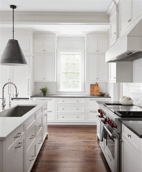 White Kitchen With Black Countertops