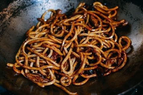 Mix seasoning liquid (soy sauce, water, sesame oil, oyster sauce, chilli paste, sugar, mirin, and cornstarch) and set beside wok. Shanghai Fried Noodles (Cu Chao Mian) - The Woks of Life