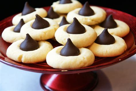 Chocolate packed hershey kiss cookies are rolled in sugar & baked with a hershey's kiss in the middle. Hershey Kiss Gingerbread Cookies Recipe — Dishmaps