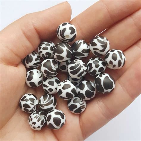 Fekete fehér foltos szilikon gyöngy (12 mm) | Kézműves sapkák és ...