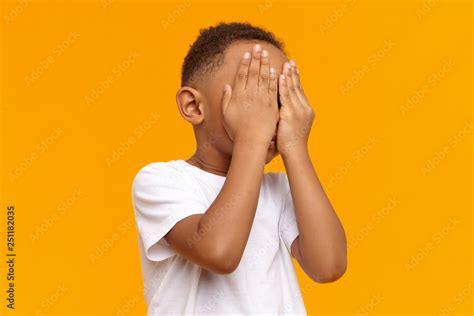Human Emotions Reaction And Body Language Unrecognizable Black Child