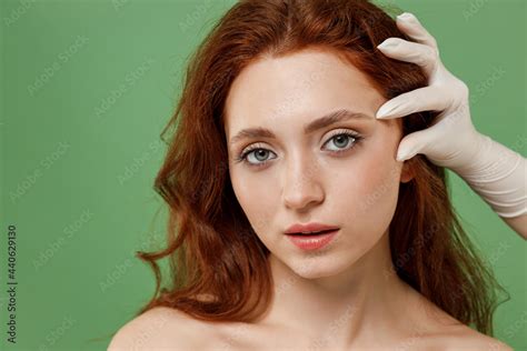 beautiful half naked topless redhead hair woman 20s nude make up visit doctor hand touch face