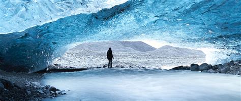 Download Wallpaper 2560x1080 Cave Ice Man Glacier Frozen Dual Wide 1080p Hd Background