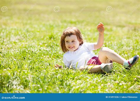 Happy Child Playing At Grass Meadow Stock Photo Image Of Seasonal