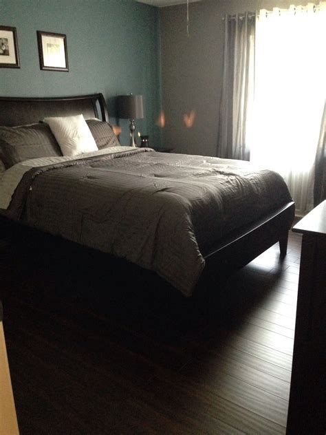 Decorate with lively furnishing, and. Master Bedroom with Dark Laminate flooring, medium gray ...