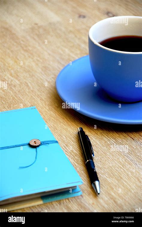 Coffee Notebook And Pen Stock Photo Alamy