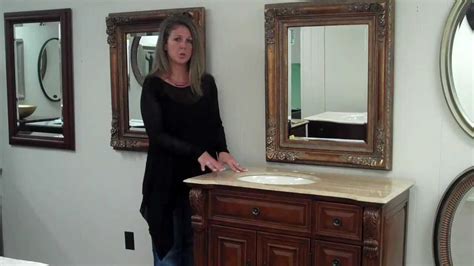 It features a series of soft closing doors and full extension drawers to take care of your storage needs. Offset Bathroom Vanities - YouTube