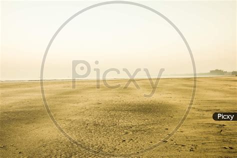 Image Of The Sunrise On A Peaceful Silent And Empty Beach Lv307988 Picxy