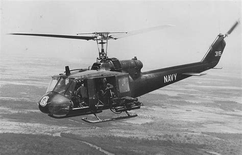 Bell Uh 1 “huey” Gunship With Ha L 3 Usn Over Vietnam R Helicopters