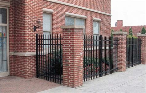 Perimeter Wrought Iron Fence With Brick Pillars Residential