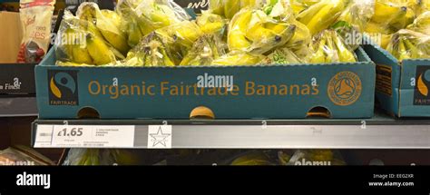 Organic Food Fairtrade Ripe Fresh Bananas In Boxes Displayed On Shelves