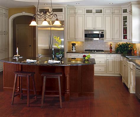 The kitchen island features a natural finish top that will easily enhance your decor. Maple cabinets with a cherry island - Ceramic Tile World ...