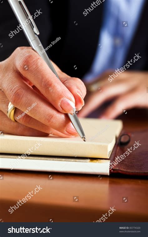Business Woman Writing With Pen In Notepad Stock Photo 83774320 Shutterstock