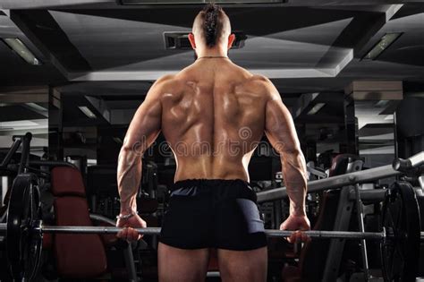 Muscular Man Lifting Some Heavy Barbells Stock Image Image Of Adult