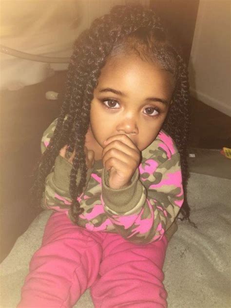 Her hair is straight , blond and short. 40 Cute Hairstyles for Black Little Girls | herinterest.com/