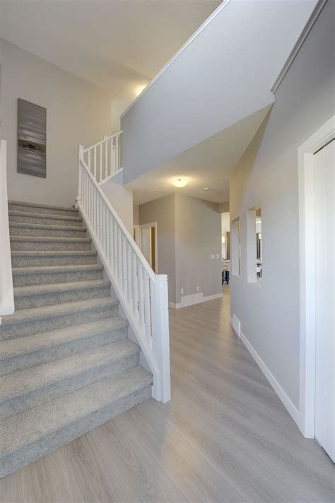 The Foyer In This Home Is Bright And Open Head Up The Stairs To The