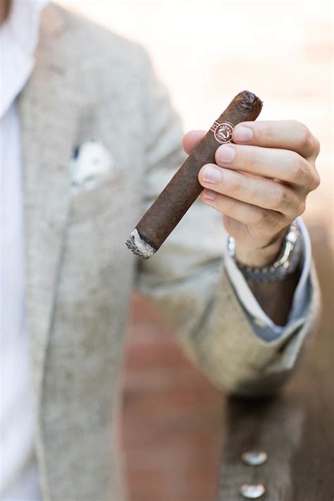 How To Smoke A Cigar Properly Cigar 101 He Spoke Style