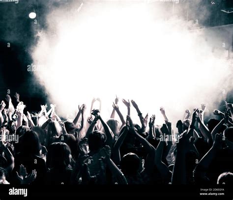 Concert Crowd Hands Up Toned Stock Photo Alamy