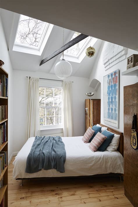 Or your guest room was more than a dumping ground? This eclectic bedroom feels bigger with the roof windows ...