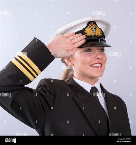 Portrait Of A Young Female Naval Officer Saluting Woman Stock Photo Alamy