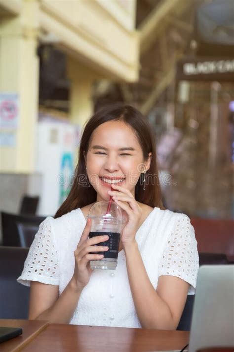 lovely asian woman wearing glasses sitting at coffee shop stock image image of restaurant