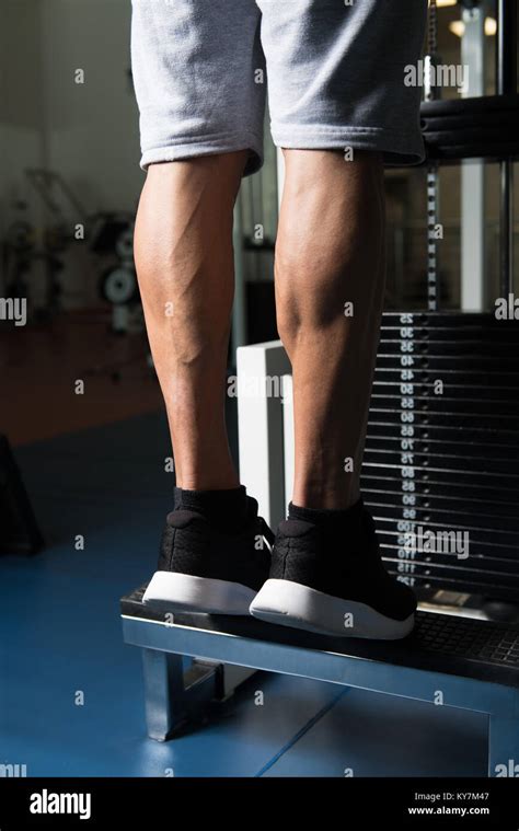 Bodybuilders Legs Shot Close Up In A Gym In Workout Stock Photo Alamy