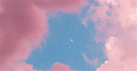 Crescent Moon With Star In The Middle Of The Pink Sky