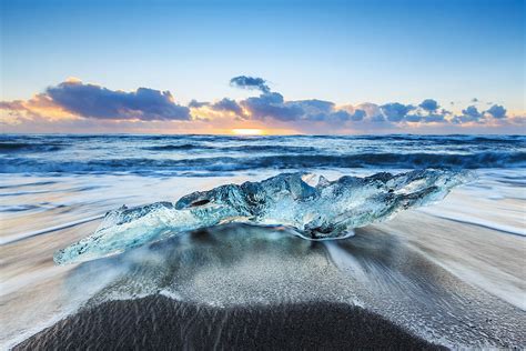 Iceberg On A Black Sand Beach Jokulsarlon Photograph By Stefano Savi
