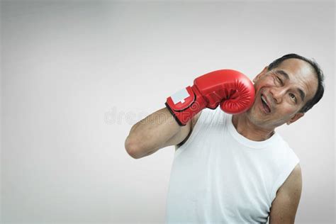 Portrait Of Asian Senior Man Punching His Face Stock Image Image Of